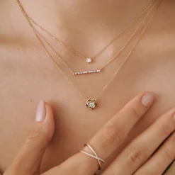 Diamond Flower Pendant In 14K Yellow Gold (1/10 Ct. Tw.)