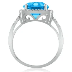 Emerald Cut Blue Topaz & Diamond Ring In 14K White Gold (1/4 Ct. Tw.)