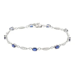 Oval Blue Sapphire And Diamond Bracelet In 10K White Gold (1/3 Ct. Tw.)
